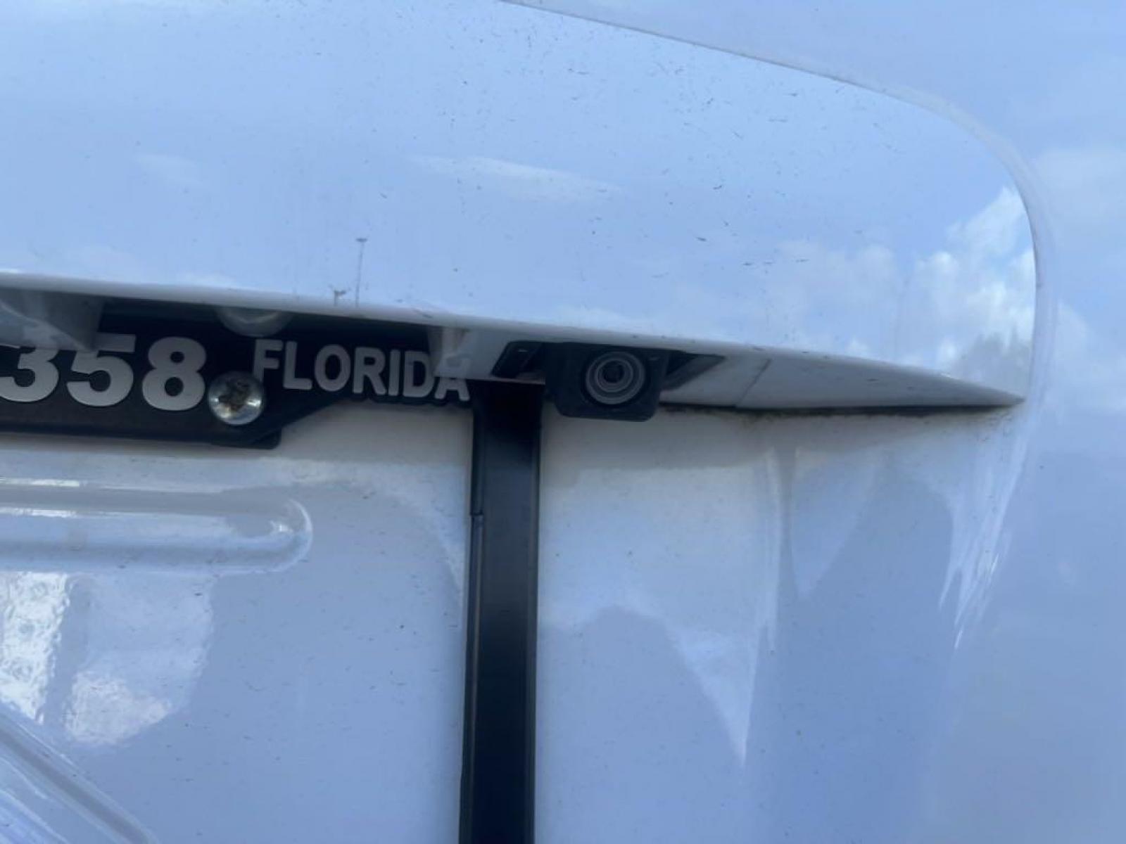 2016 Summit White /Light Titanium Buick Enclave Leather Group (5GAKRBKD9GJ) with an 3.6L V6 SIDI VVT engine, Automatic transmission, located at 27610 S Dixie Hwy, Homestead, FL, 33032, (305) 749-2348, 25.510241, -80.438301 - Photo #22
