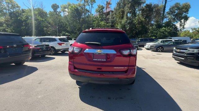 2013 Crystal Red Tintcoat /Ebony/Mojave Chevrolet Traverse 1LT FWD (1GNKRGKD0DJ) with an 6 3.6L engine, Automatic transmission, located at 27610 S Dixie Hwy, Homestead, FL, 33032, (305) 749-2348, 25.510241, -80.438301 - IIHS Top Safety Pick. Only 131,893 Miles! Boasts 24 Highway MPG and 17 City MPG! This Chevrolet Traverse delivers a Gas V6 3.6L/217 engine powering this Automatic transmission. SEATING, 8-PASSENGER (2-3-3 SEATING CONFIGURATION) with 2nd and 3rd row 60/40 split flat-folding bench seat (STD), RECLININ - Photo#3