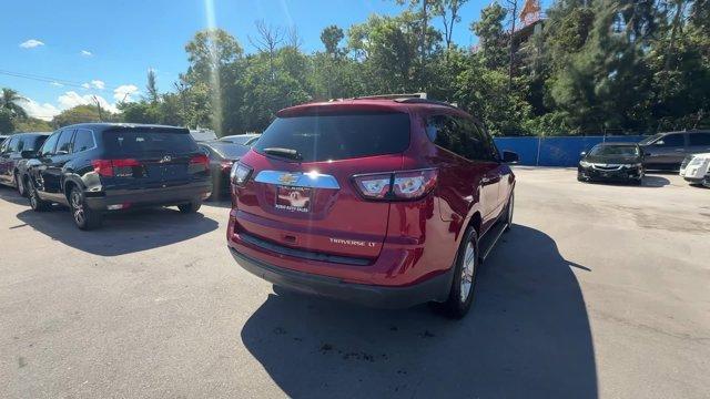 2013 Crystal Red Tintcoat /Ebony/Mojave Chevrolet Traverse 1LT FWD (1GNKRGKD0DJ) with an 6 3.6L engine, Automatic transmission, located at 27610 S Dixie Hwy, Homestead, FL, 33032, (305) 749-2348, 25.510241, -80.438301 - IIHS Top Safety Pick. Only 131,893 Miles! Boasts 24 Highway MPG and 17 City MPG! This Chevrolet Traverse delivers a Gas V6 3.6L/217 engine powering this Automatic transmission. SEATING, 8-PASSENGER (2-3-3 SEATING CONFIGURATION) with 2nd and 3rd row 60/40 split flat-folding bench seat (STD), RECLININ - Photo#4