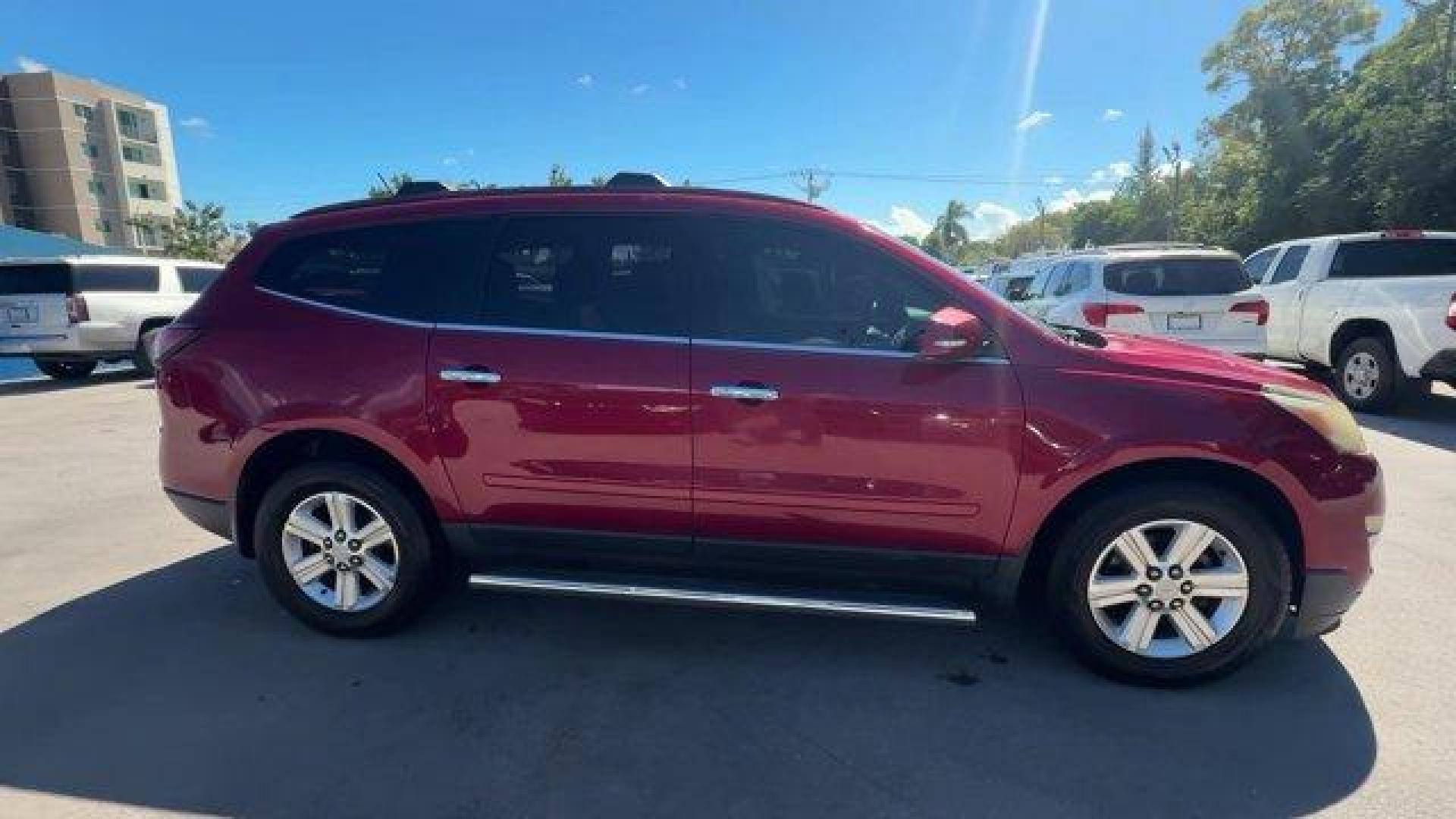 2013 Crystal Red Tintcoat /Ebony/Mojave Chevrolet Traverse 1LT FWD (1GNKRGKD0DJ) with an 6 3.6L engine, Automatic transmission, located at 27610 S Dixie Hwy, Homestead, FL, 33032, (305) 749-2348, 25.510241, -80.438301 - IIHS Top Safety Pick. Only 131,893 Miles! Boasts 24 Highway MPG and 17 City MPG! This Chevrolet Traverse delivers a Gas V6 3.6L/217 engine powering this Automatic transmission. SEATING, 8-PASSENGER (2-3-3 SEATING CONFIGURATION) with 2nd and 3rd row 60/40 split flat-folding bench seat (STD), RECLININ - Photo#5