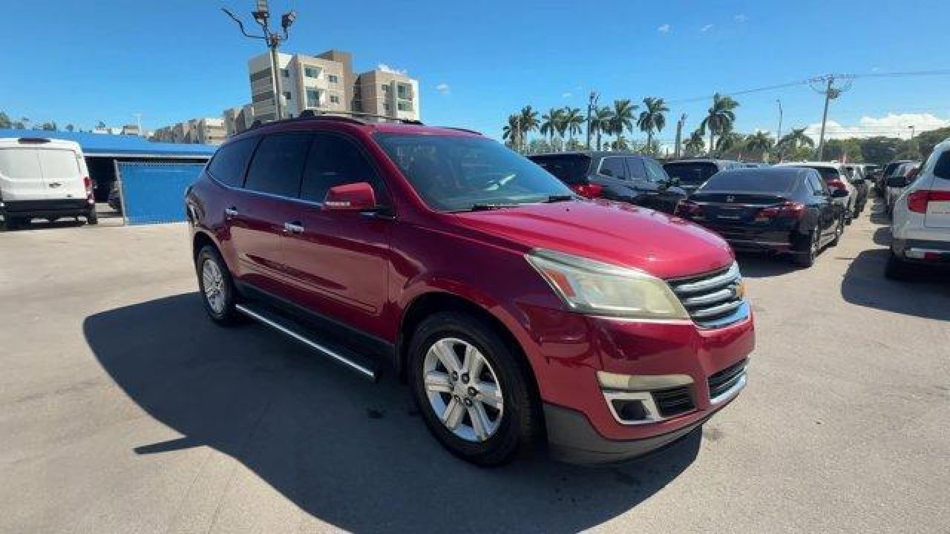 2013 Crystal Red Tintcoat /Ebony/Mojave Chevrolet Traverse 1LT FWD (1GNKRGKD0DJ) with an 6 3.6L engine, Automatic transmission, located at 27610 S Dixie Hwy, Homestead, FL, 33032, (305) 749-2348, 25.510241, -80.438301 - IIHS Top Safety Pick. Only 131,893 Miles! Boasts 24 Highway MPG and 17 City MPG! This Chevrolet Traverse delivers a Gas V6 3.6L/217 engine powering this Automatic transmission. SEATING, 8-PASSENGER (2-3-3 SEATING CONFIGURATION) with 2nd and 3rd row 60/40 split flat-folding bench seat (STD), RECLININ - Photo#6