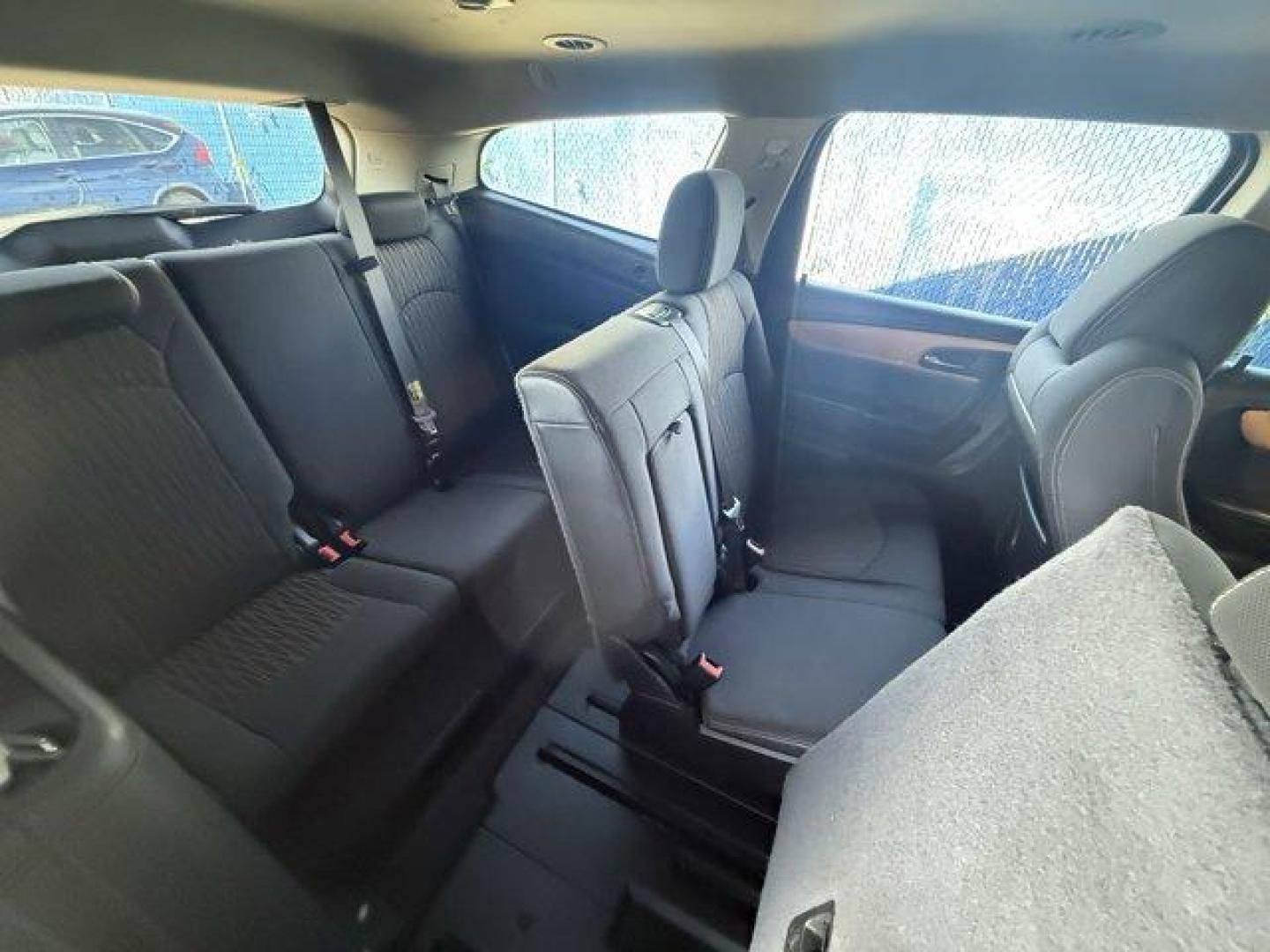 2013 Crystal Red Tintcoat /Ebony/Mojave Chevrolet Traverse 1LT FWD (1GNKRGKD0DJ) with an 6 3.6L engine, Automatic transmission, located at 27610 S Dixie Hwy, Homestead, FL, 33032, (305) 749-2348, 25.510241, -80.438301 - IIHS Top Safety Pick. Only 131,893 Miles! Boasts 24 Highway MPG and 17 City MPG! This Chevrolet Traverse delivers a Gas V6 3.6L/217 engine powering this Automatic transmission. SEATING, 8-PASSENGER (2-3-3 SEATING CONFIGURATION) with 2nd and 3rd row 60/40 split flat-folding bench seat (STD), RECLININ - Photo#11