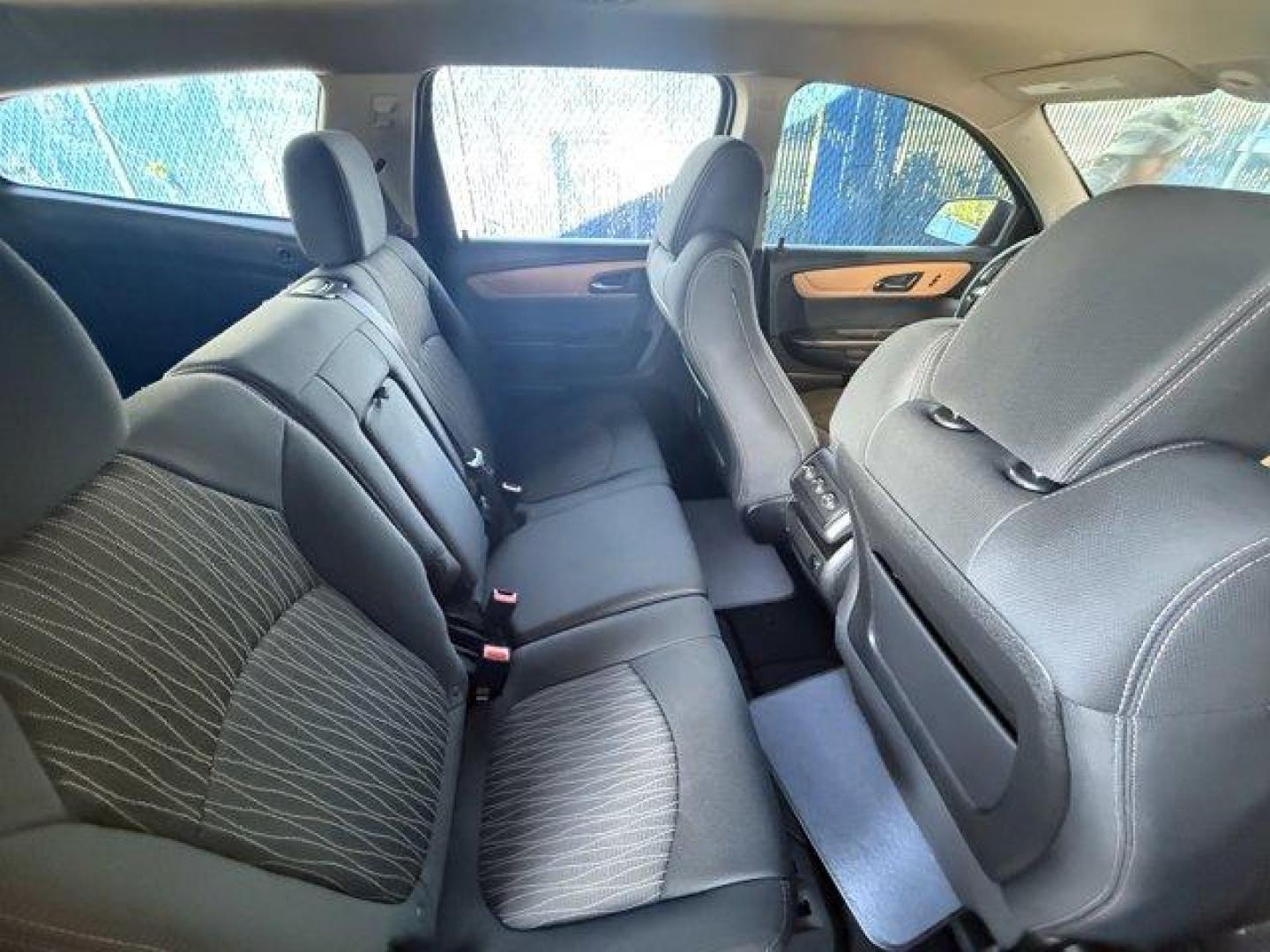 2013 Crystal Red Tintcoat /Ebony/Mojave Chevrolet Traverse 1LT FWD (1GNKRGKD0DJ) with an 6 3.6L engine, Automatic transmission, located at 27610 S Dixie Hwy, Homestead, FL, 33032, (305) 749-2348, 25.510241, -80.438301 - IIHS Top Safety Pick. Only 131,893 Miles! Boasts 24 Highway MPG and 17 City MPG! This Chevrolet Traverse delivers a Gas V6 3.6L/217 engine powering this Automatic transmission. SEATING, 8-PASSENGER (2-3-3 SEATING CONFIGURATION) with 2nd and 3rd row 60/40 split flat-folding bench seat (STD), RECLININ - Photo#12