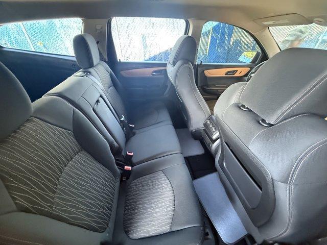 2013 Crystal Red Tintcoat /Ebony/Mojave Chevrolet Traverse 1LT FWD (1GNKRGKD0DJ) with an 6 3.6L engine, Automatic transmission, located at 27610 S Dixie Hwy, Homestead, FL, 33032, (305) 749-2348, 25.510241, -80.438301 - IIHS Top Safety Pick. Only 131,893 Miles! Boasts 24 Highway MPG and 17 City MPG! This Chevrolet Traverse delivers a Gas V6 3.6L/217 engine powering this Automatic transmission. SEATING, 8-PASSENGER (2-3-3 SEATING CONFIGURATION) with 2nd and 3rd row 60/40 split flat-folding bench seat (STD), RECLININ - Photo#12