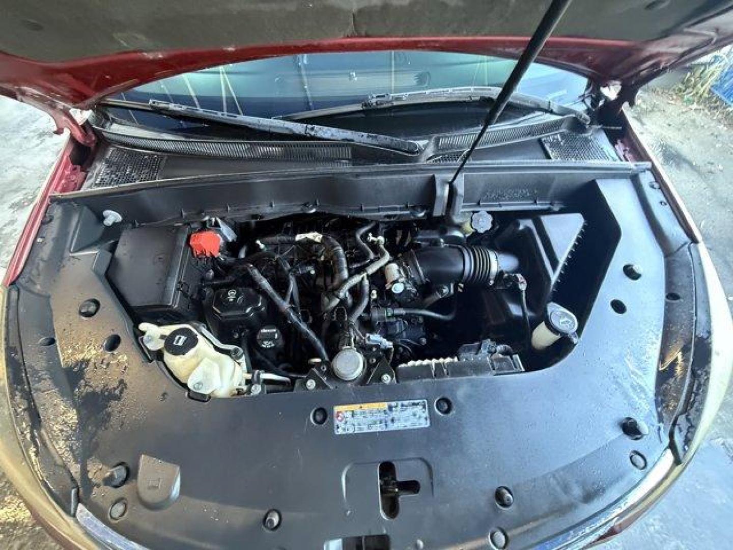 2013 Crystal Red Tintcoat /Ebony/Mojave Chevrolet Traverse 1LT FWD (1GNKRGKD0DJ) with an 6 3.6L engine, Automatic transmission, located at 27610 S Dixie Hwy, Homestead, FL, 33032, (305) 749-2348, 25.510241, -80.438301 - IIHS Top Safety Pick. Only 131,893 Miles! Boasts 24 Highway MPG and 17 City MPG! This Chevrolet Traverse delivers a Gas V6 3.6L/217 engine powering this Automatic transmission. SEATING, 8-PASSENGER (2-3-3 SEATING CONFIGURATION) with 2nd and 3rd row 60/40 split flat-folding bench seat (STD), RECLININ - Photo#15