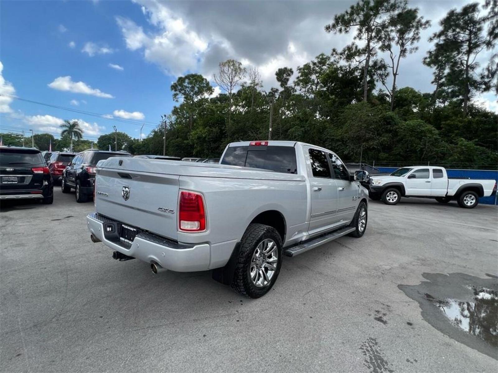 2014 Bright Silver Metallic Clearcoat /Black Ram 1500 Laramie Longhorn (1C6RR7WT2ES) with an HEMI 5.7L V8 Multi Displacement VVT engine, Automatic transmission, located at 27610 S Dixie Hwy, Homestead, FL, 33032, (305) 749-2348, 25.510241, -80.438301 - Photo #2