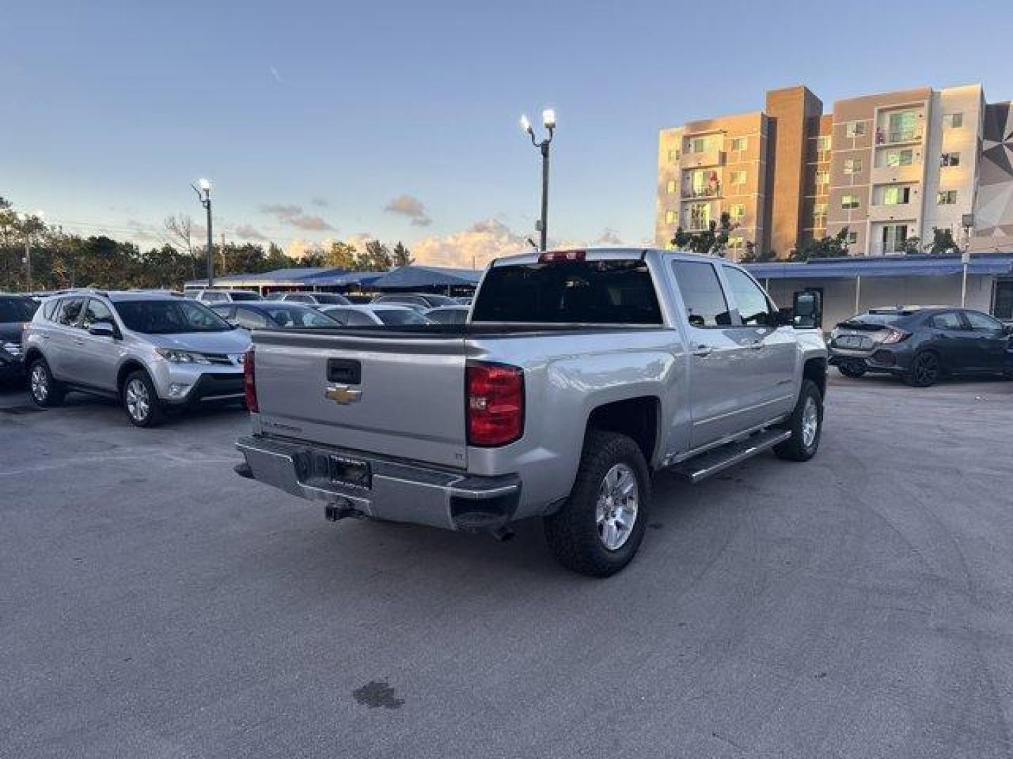2018 Silver Ice Metallic /Dark Ash with Jet Black Interior Accents Chevrolet Silverado 1500 LT (3GCPCREC8JG) with an 8 5.3L engine, Automatic transmission, located at 27610 S Dixie Hwy, Homestead, FL, 33032, (305) 749-2348, 25.510241, -80.438301 - KBB.com 10 Most Awarded Brands. Delivers 23 Highway MPG and 16 City MPG! This Chevrolet Silverado 1500 boasts a Gas/Ethanol V8 5.3L/325 engine powering this Automatic transmission. WIRELESS CHARGING, WHEELS, 17 X 8 (43.2 CM X 20.3 CM) BRIGHT MACHINED ALUMINUM (STD), TRANSMISSION, 6-SPEED AUTOMATIC, - Photo#4
