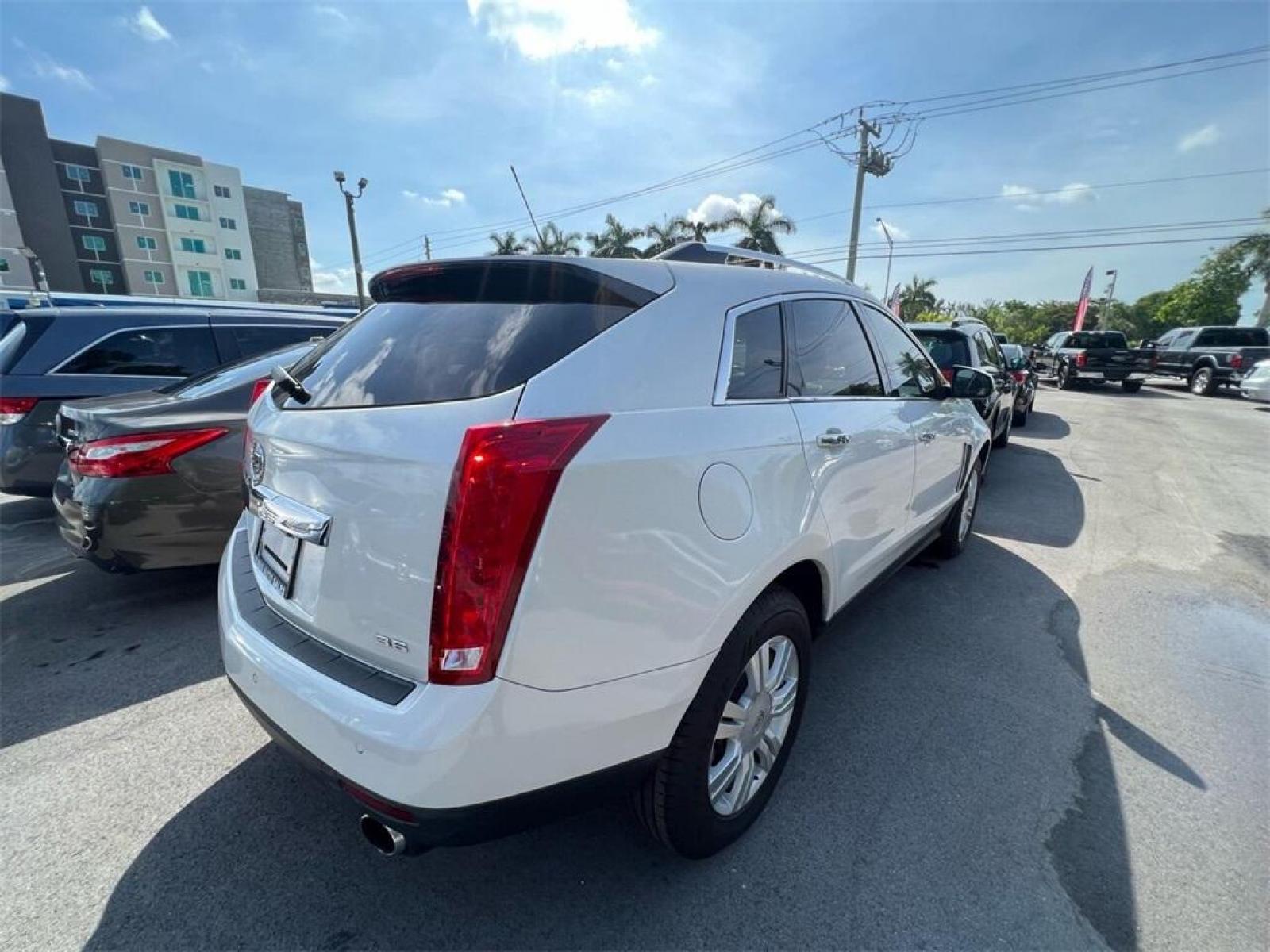 2016 Platinum Ice Tricoat /Shale With Brownstone Accents Cadillac SRX Luxury (3GYFNBE30GS) with an 3.6L V6 DGI DOHC VVT engine, Automatic transmission, located at 27610 S Dixie Hwy, Homestead, FL, 33032, (305) 749-2348, 25.510241, -80.438301 - Photo #2