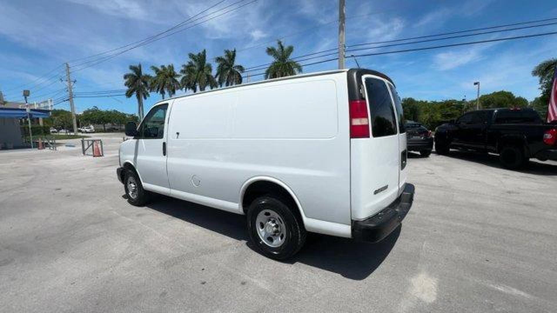 2014 Summit White /Medium Pewter Chevrolet Express Cargo Van Work Van (1GCWGFCA3E1) with an 8 4.8L engine, Automatic transmission, located at 27610 S Dixie Hwy, Homestead, FL, 33032, (305) 749-2348, 25.510241, -80.438301 - KBB.com Brand Image Awards. This Chevrolet Express Cargo Van delivers a Gas/Ethanol V8 4.8L/293 engine powering this Automatic transmission. TRANSMISSION, 6-SPEED AUTOMATIC, HEAVY-DUTY, ELECTRONICALLY CONTROLLED with overdrive tow/haul mode and internal transmission oil cooler (STD), TRAILER WIRING, - Photo#2