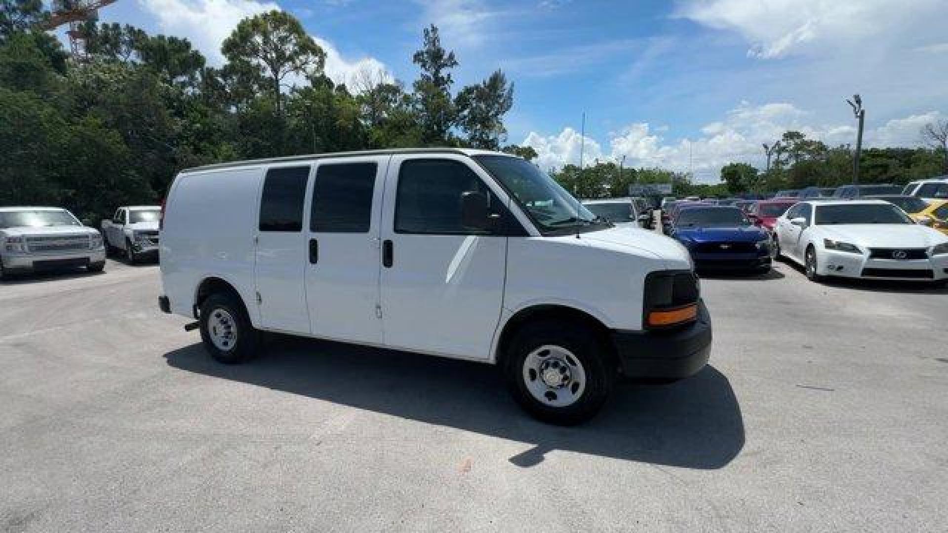 2014 Summit White /Medium Pewter Chevrolet Express Cargo Van Work Van (1GCWGFCA3E1) with an 8 4.8L engine, Automatic transmission, located at 27610 S Dixie Hwy, Homestead, FL, 33032, (305) 749-2348, 25.510241, -80.438301 - KBB.com Brand Image Awards. This Chevrolet Express Cargo Van delivers a Gas/Ethanol V8 4.8L/293 engine powering this Automatic transmission. TRANSMISSION, 6-SPEED AUTOMATIC, HEAVY-DUTY, ELECTRONICALLY CONTROLLED with overdrive tow/haul mode and internal transmission oil cooler (STD), TRAILER WIRING, - Photo#6