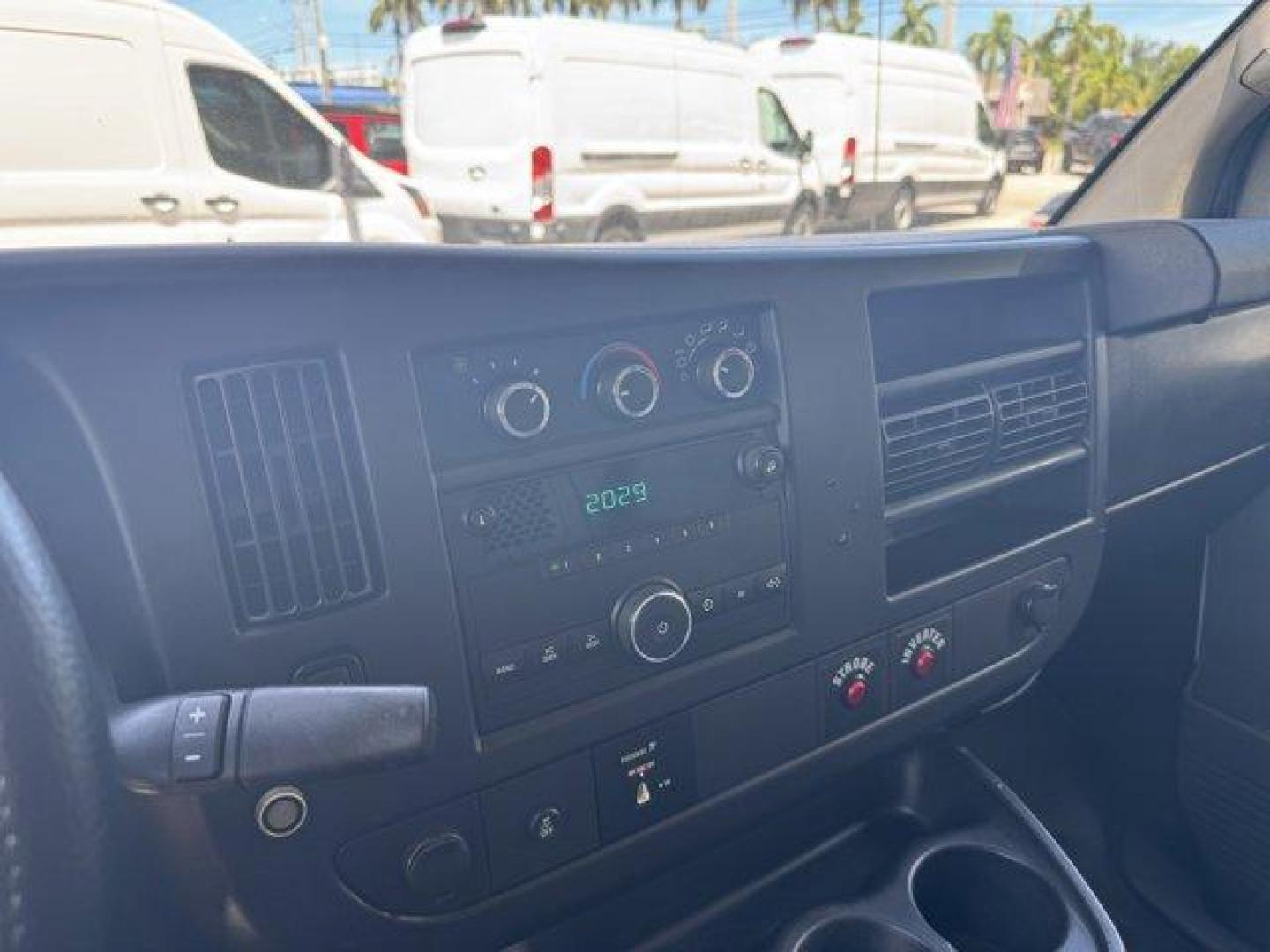 2014 Summit White /Medium Pewter Chevrolet Express Cargo Van Work Van (1GCWGFCA3E1) with an 8 4.8L engine, Automatic transmission, located at 27610 S Dixie Hwy, Homestead, FL, 33032, (305) 749-2348, 25.510241, -80.438301 - KBB.com Brand Image Awards. This Chevrolet Express Cargo Van delivers a Gas/Ethanol V8 4.8L/293 engine powering this Automatic transmission. TRANSMISSION, 6-SPEED AUTOMATIC, HEAVY-DUTY, ELECTRONICALLY CONTROLLED with overdrive tow/haul mode and internal transmission oil cooler (STD), TRAILER WIRING, - Photo#9
