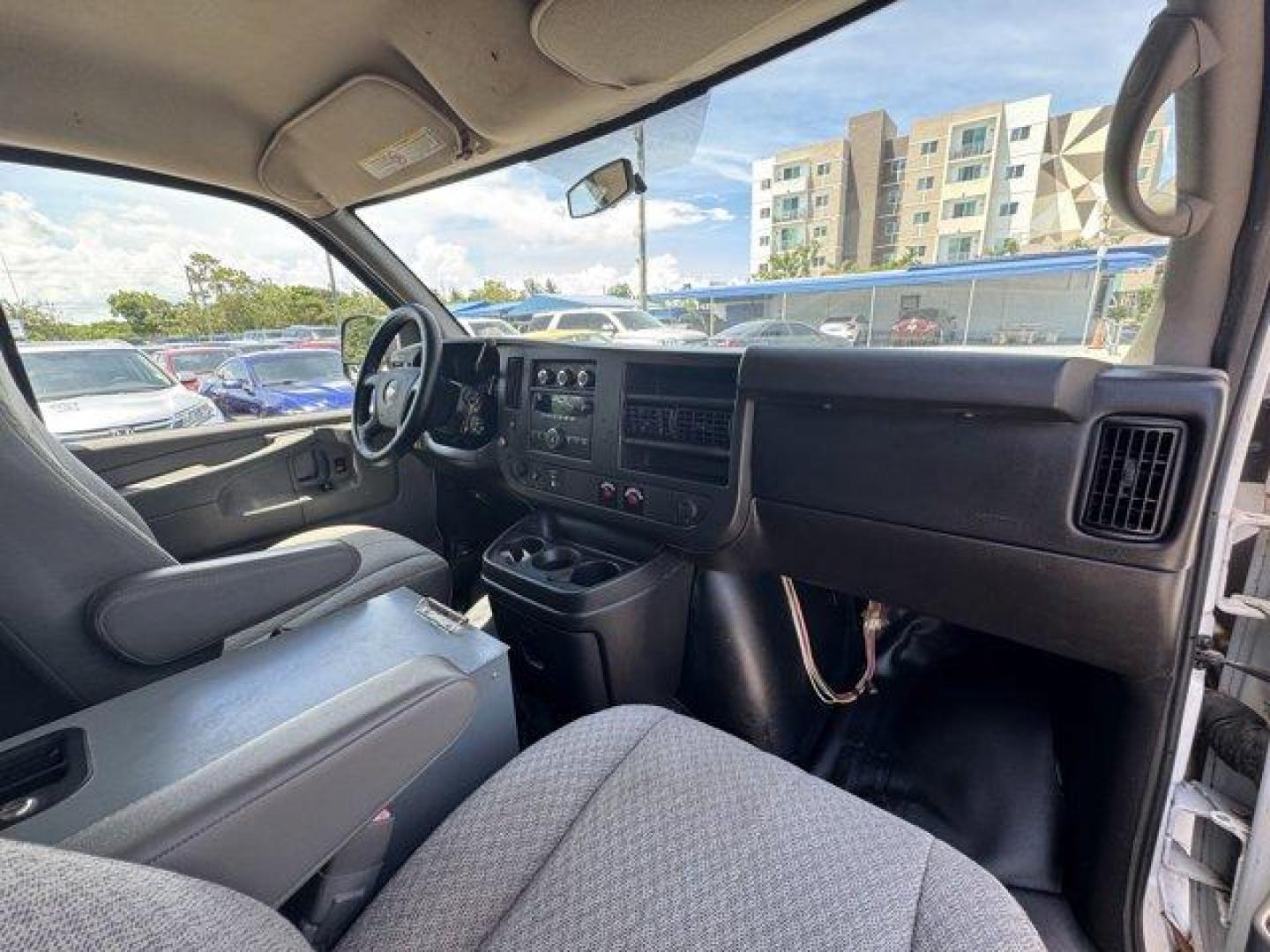 2014 Summit White /Medium Pewter Chevrolet Express Cargo Van Work Van (1GCWGFCA3E1) with an 8 4.8L engine, Automatic transmission, located at 27610 S Dixie Hwy, Homestead, FL, 33032, (305) 749-2348, 25.510241, -80.438301 - KBB.com Brand Image Awards. This Chevrolet Express Cargo Van delivers a Gas/Ethanol V8 4.8L/293 engine powering this Automatic transmission. TRANSMISSION, 6-SPEED AUTOMATIC, HEAVY-DUTY, ELECTRONICALLY CONTROLLED with overdrive tow/haul mode and internal transmission oil cooler (STD), TRAILER WIRING, - Photo#11