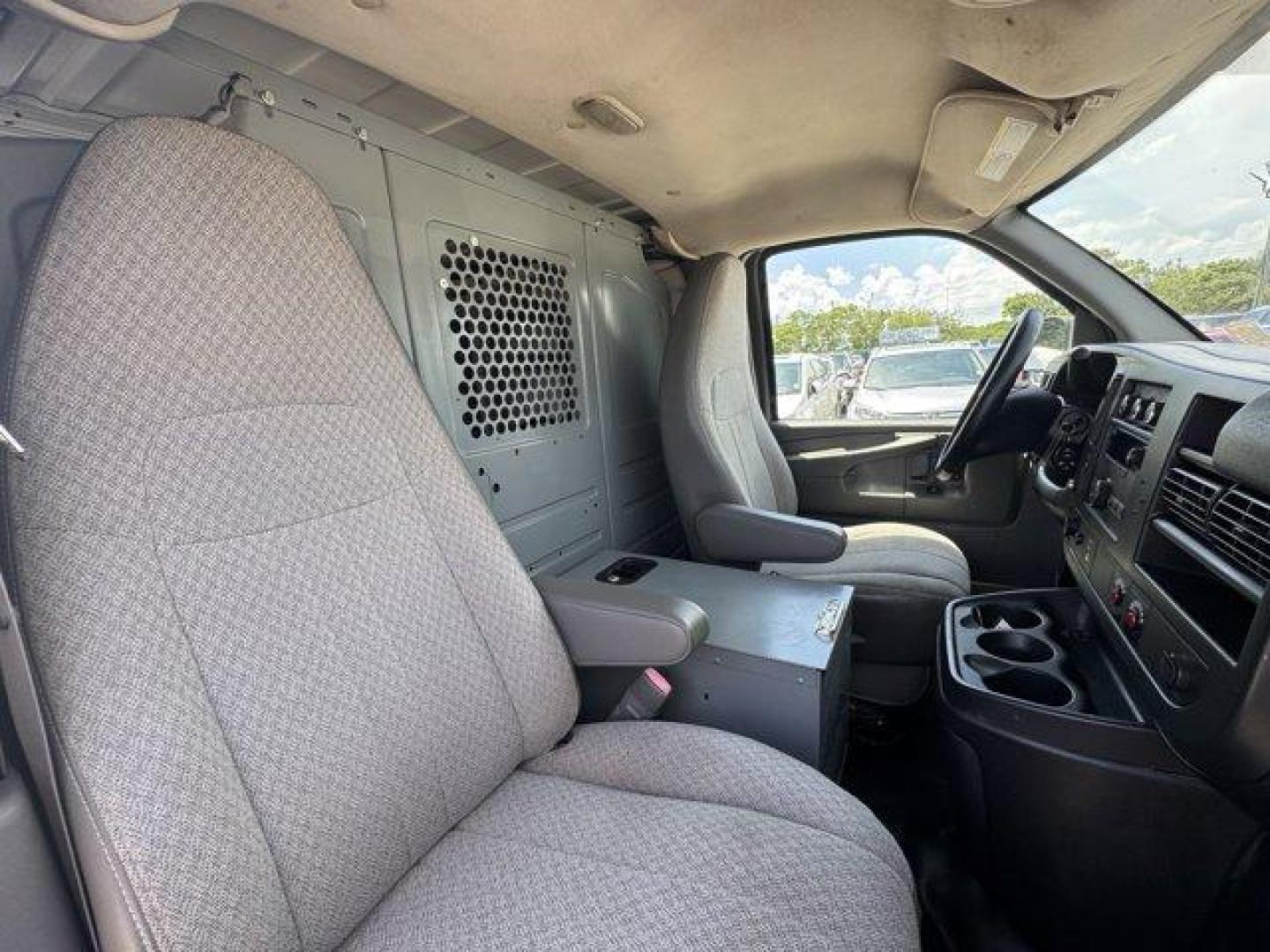 2014 Summit White /Medium Pewter Chevrolet Express Cargo Van Work Van (1GCWGFCA3E1) with an 8 4.8L engine, Automatic transmission, located at 27610 S Dixie Hwy, Homestead, FL, 33032, (305) 749-2348, 25.510241, -80.438301 - KBB.com Brand Image Awards. This Chevrolet Express Cargo Van delivers a Gas/Ethanol V8 4.8L/293 engine powering this Automatic transmission. TRANSMISSION, 6-SPEED AUTOMATIC, HEAVY-DUTY, ELECTRONICALLY CONTROLLED with overdrive tow/haul mode and internal transmission oil cooler (STD), TRAILER WIRING, - Photo#12