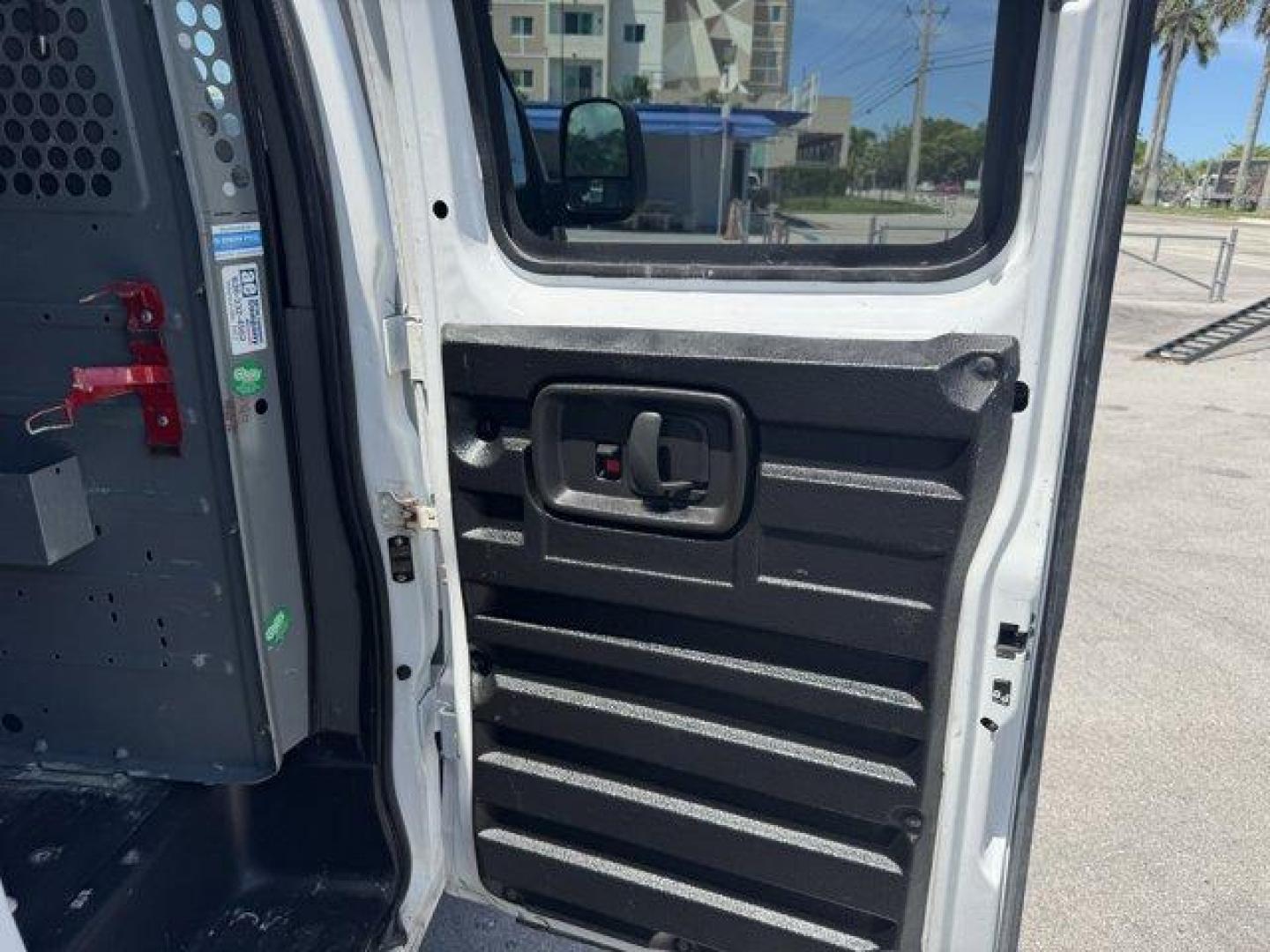 2014 Summit White /Medium Pewter Chevrolet Express Cargo Van Work Van (1GCWGFCA3E1) with an 8 4.8L engine, Automatic transmission, located at 27610 S Dixie Hwy, Homestead, FL, 33032, (305) 749-2348, 25.510241, -80.438301 - KBB.com Brand Image Awards. This Chevrolet Express Cargo Van delivers a Gas/Ethanol V8 4.8L/293 engine powering this Automatic transmission. TRANSMISSION, 6-SPEED AUTOMATIC, HEAVY-DUTY, ELECTRONICALLY CONTROLLED with overdrive tow/haul mode and internal transmission oil cooler (STD), TRAILER WIRING, - Photo#16