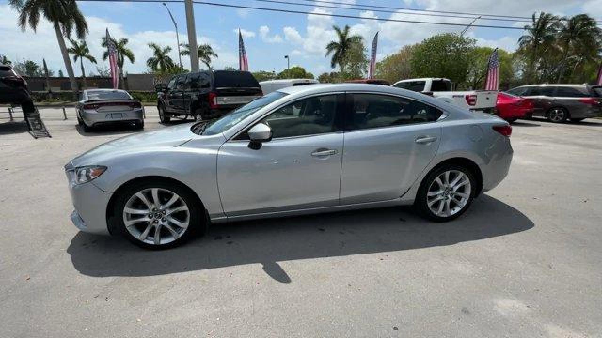 2016 Sonic Silver Metallic /Black Mazda Mazda6 i Touring (JM1GJ1V55G1) with an 4 2.5 L engine, Automatic transmission, located at 27610 S Dixie Hwy, Homestead, FL, 33032, (305) 749-2348, 25.510241, -80.438301 - IIHS Top Safety Pick+, Top Safety Pick+. Delivers 38 Highway MPG and 26 City MPG! This Mazda Mazda6 boasts a Regular Unleaded I-4 2.5 L/152 engine powering this Automatic transmission. Window Grid Antenna, Wheels: 19 Alloy, Variable Intermittent Wipers.* This Mazda Mazda6 Features the Following Opti - Photo#1