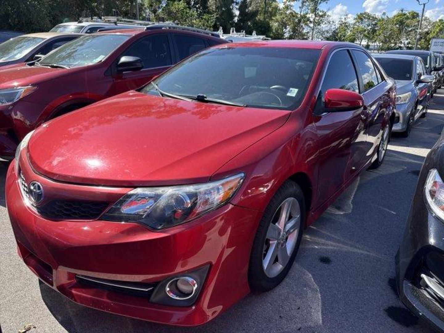 2013 Red Toyota Camry (4T1BF1FK4DU) with an 4 2.5L engine, Automatic transmission, located at 27610 S Dixie Hwy, Homestead, FL, 33032, (305) 749-2348, 25.510241, -80.438301 - KBB.com 10 Best New Sedans Under $25,000. Only 119,306 Miles! Boasts 35 Highway MPG and 25 City MPG! This Toyota Camry delivers a Gas I4 2.5L/152 engine powering this Automatic transmission. Whiplash-lessening front seats, Vehicle stability control, Variable assist pwr rack and pinion steering.* T - Photo#0