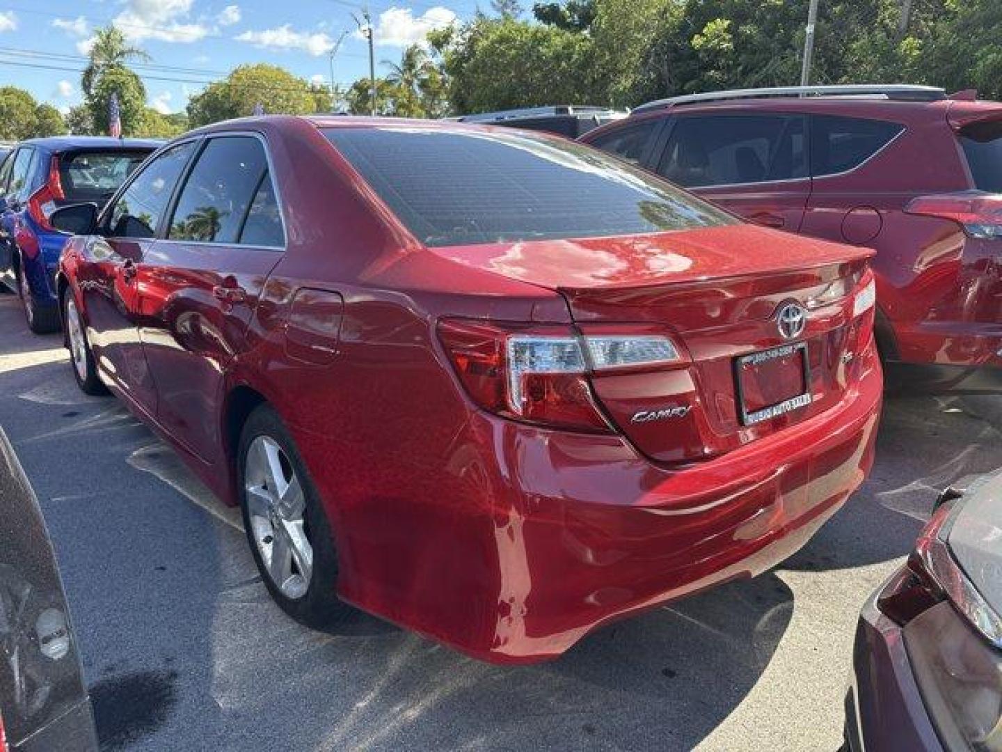 2013 Red Toyota Camry (4T1BF1FK4DU) with an 4 2.5L engine, Automatic transmission, located at 27610 S Dixie Hwy, Homestead, FL, 33032, (305) 749-2348, 25.510241, -80.438301 - KBB.com 10 Best New Sedans Under $25,000. Only 119,306 Miles! Boasts 35 Highway MPG and 25 City MPG! This Toyota Camry delivers a Gas I4 2.5L/152 engine powering this Automatic transmission. Whiplash-lessening front seats, Vehicle stability control, Variable assist pwr rack and pinion steering.* T - Photo#1