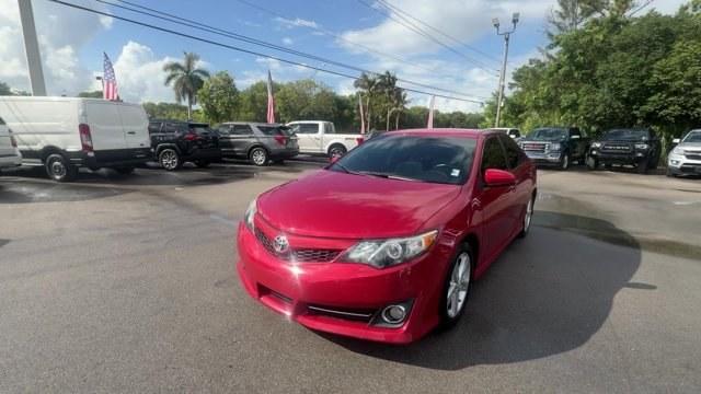 2013 Red Toyota Camry (4T1BF1FK4DU) with an 4 2.5L engine, Automatic transmission, located at 27610 S Dixie Hwy, Homestead, FL, 33032, (305) 749-2348, 25.510241, -80.438301 - KBB.com 10 Best New Sedans Under $25,000. Only 119,306 Miles! Boasts 35 Highway MPG and 25 City MPG! This Toyota Camry delivers a Gas I4 2.5L/152 engine powering this Automatic transmission. Whiplash-lessening front seats, Vehicle stability control, Variable assist pwr rack and pinion steering.* T- Photo#0