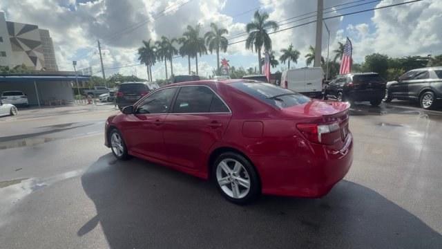 2013 Red Toyota Camry (4T1BF1FK4DU) with an 4 2.5L engine, Automatic transmission, located at 27610 S Dixie Hwy, Homestead, FL, 33032, (305) 749-2348, 25.510241, -80.438301 - KBB.com 10 Best New Sedans Under $25,000. Only 119,306 Miles! Boasts 35 Highway MPG and 25 City MPG! This Toyota Camry delivers a Gas I4 2.5L/152 engine powering this Automatic transmission. Whiplash-lessening front seats, Vehicle stability control, Variable assist pwr rack and pinion steering.* T- Photo#2