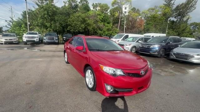 2013 Red Toyota Camry (4T1BF1FK4DU) with an 4 2.5L engine, Automatic transmission, located at 27610 S Dixie Hwy, Homestead, FL, 33032, (305) 749-2348, 25.510241, -80.438301 - KBB.com 10 Best New Sedans Under $25,000. Only 119,306 Miles! Boasts 35 Highway MPG and 25 City MPG! This Toyota Camry delivers a Gas I4 2.5L/152 engine powering this Automatic transmission. Whiplash-lessening front seats, Vehicle stability control, Variable assist pwr rack and pinion steering.* T- Photo#6