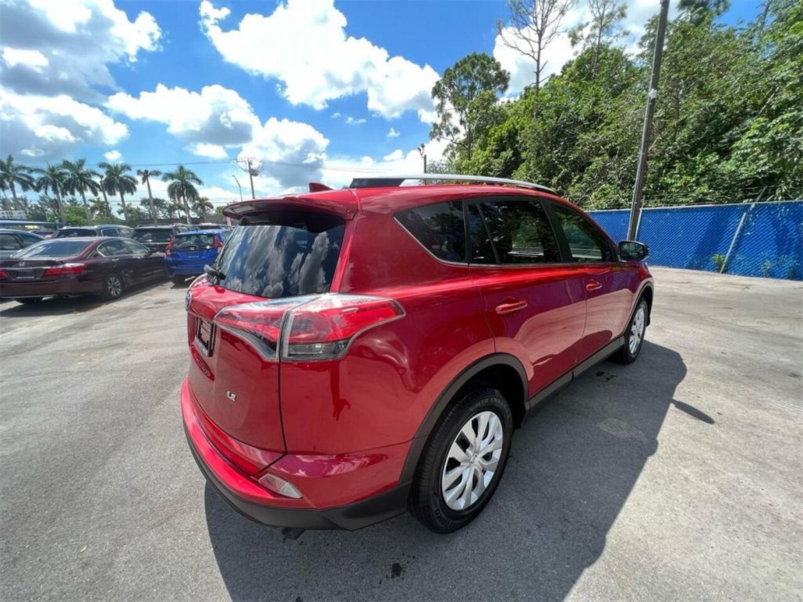 2016 Barcelona Red Metallic Toyota RAV4 LE (JTMZFREV1GJ) with an 2.5L 4-Cylinder DOHC Dual VVT-i engine, Automatic transmission, located at 27610 S Dixie Hwy, Homestead, FL, 33032, (305) 749-2348, 25.510241, -80.438301 - Photo #3