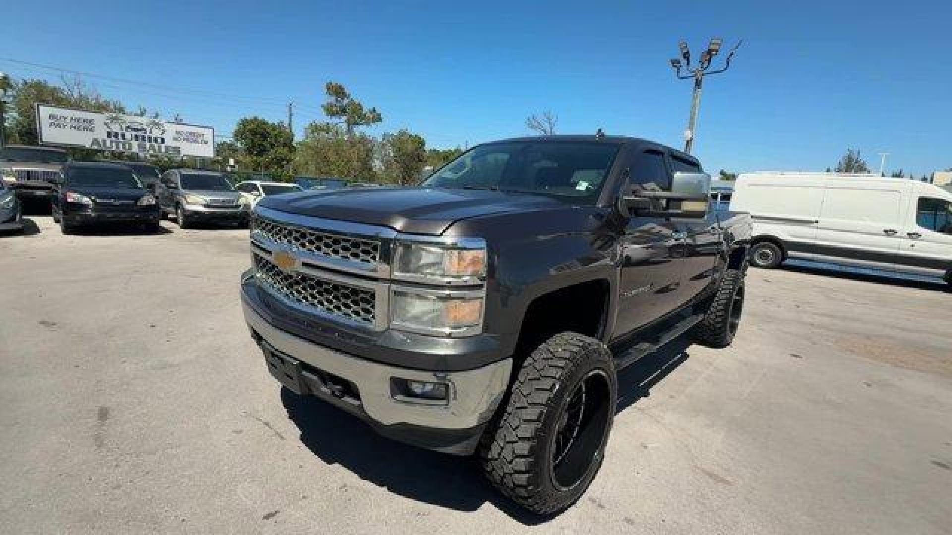 2014 Tungsten Metallic /Jet Black Chevrolet Silverado 1500 LT (3GCUKREC9EG) with an 8 5.3L engine, Automatic transmission, located at 27610 S Dixie Hwy, Homestead, FL, 33032, (305) 749-2348, 25.510241, -80.438301 - NACTOY 2014 North American Truck of the Year. Boasts 22 Highway MPG and 16 City MPG! This Chevrolet Silverado 1500 boasts a Gas/Ethanol V8 5.3L/325 engine powering this Automatic transmission. WINDOW, POWER, REAR SLIDING WITH REAR DEFOGGER, WHEELS, 18 X 8.5 (45.7 CM X 21.6 CM) BRIGHT-MACHINED ALUMIN - Photo#0