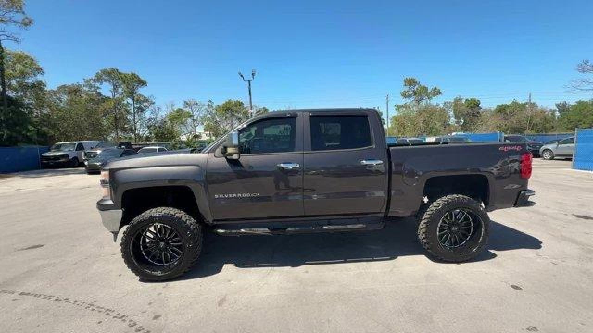 2014 Tungsten Metallic /Jet Black Chevrolet Silverado 1500 LT (3GCUKREC9EG) with an 8 5.3L engine, Automatic transmission, located at 27610 S Dixie Hwy, Homestead, FL, 33032, (305) 749-2348, 25.510241, -80.438301 - NACTOY 2014 North American Truck of the Year. Boasts 22 Highway MPG and 16 City MPG! This Chevrolet Silverado 1500 boasts a Gas/Ethanol V8 5.3L/325 engine powering this Automatic transmission. WINDOW, POWER, REAR SLIDING WITH REAR DEFOGGER, WHEELS, 18 X 8.5 (45.7 CM X 21.6 CM) BRIGHT-MACHINED ALUMIN - Photo#1