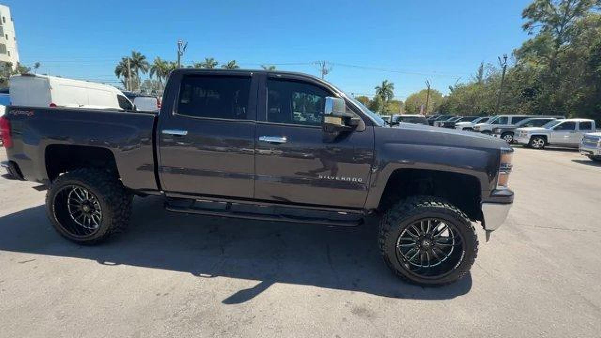 2014 Tungsten Metallic /Jet Black Chevrolet Silverado 1500 LT (3GCUKREC9EG) with an 8 5.3L engine, Automatic transmission, located at 27610 S Dixie Hwy, Homestead, FL, 33032, (305) 749-2348, 25.510241, -80.438301 - NACTOY 2014 North American Truck of the Year. Boasts 22 Highway MPG and 16 City MPG! This Chevrolet Silverado 1500 boasts a Gas/Ethanol V8 5.3L/325 engine powering this Automatic transmission. WINDOW, POWER, REAR SLIDING WITH REAR DEFOGGER, WHEELS, 18 X 8.5 (45.7 CM X 21.6 CM) BRIGHT-MACHINED ALUMIN - Photo#5