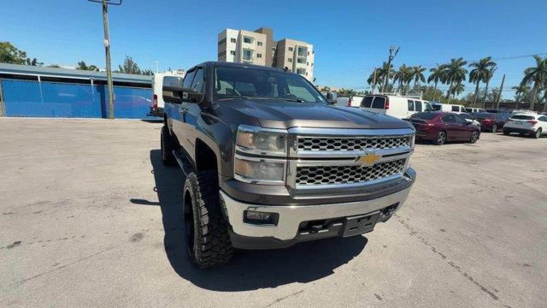 2014 Tungsten Metallic /Jet Black Chevrolet Silverado 1500 LT (3GCUKREC9EG) with an 8 5.3L engine, Automatic transmission, located at 27610 S Dixie Hwy, Homestead, FL, 33032, (305) 749-2348, 25.510241, -80.438301 - NACTOY 2014 North American Truck of the Year. Boasts 22 Highway MPG and 16 City MPG! This Chevrolet Silverado 1500 boasts a Gas/Ethanol V8 5.3L/325 engine powering this Automatic transmission. WINDOW, POWER, REAR SLIDING WITH REAR DEFOGGER, WHEELS, 18 X 8.5 (45.7 CM X 21.6 CM) BRIGHT-MACHINED ALUMIN - Photo#6
