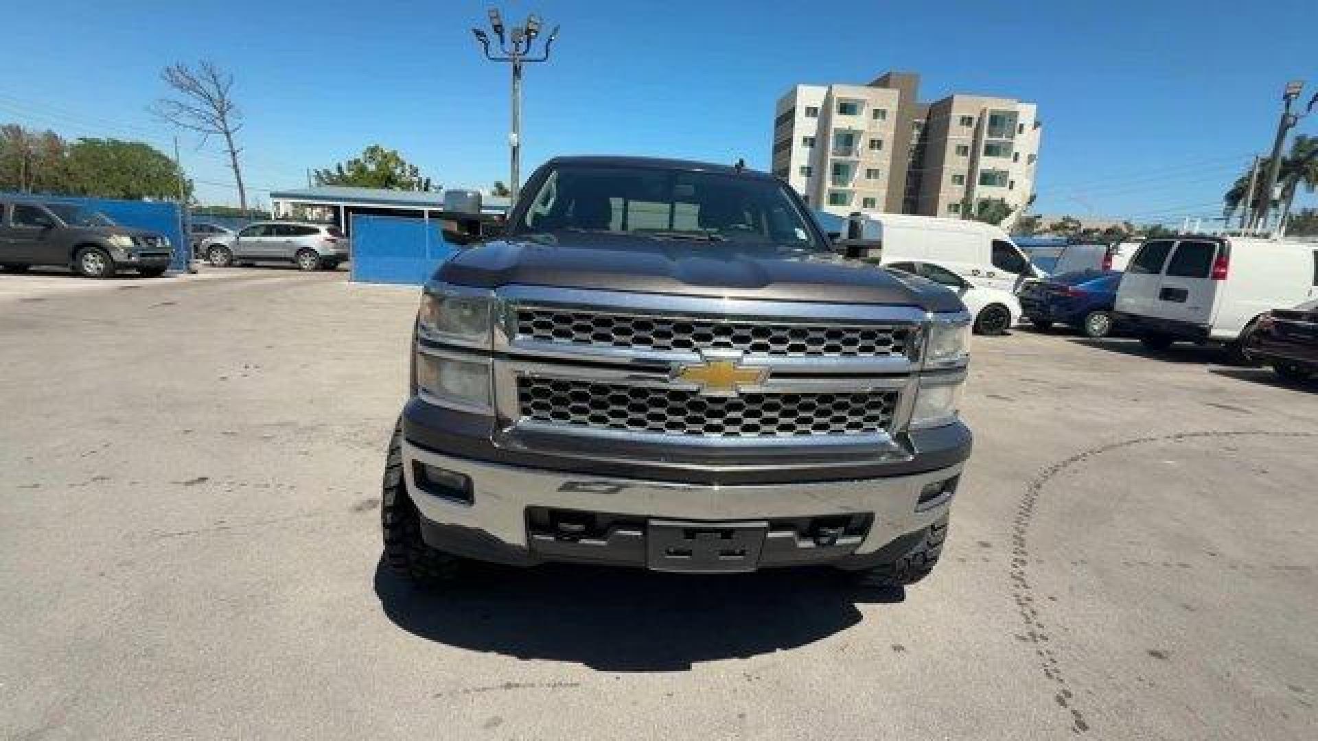 2014 Tungsten Metallic /Jet Black Chevrolet Silverado 1500 LT (3GCUKREC9EG) with an 8 5.3L engine, Automatic transmission, located at 27610 S Dixie Hwy, Homestead, FL, 33032, (305) 749-2348, 25.510241, -80.438301 - NACTOY 2014 North American Truck of the Year. Boasts 22 Highway MPG and 16 City MPG! This Chevrolet Silverado 1500 boasts a Gas/Ethanol V8 5.3L/325 engine powering this Automatic transmission. WINDOW, POWER, REAR SLIDING WITH REAR DEFOGGER, WHEELS, 18 X 8.5 (45.7 CM X 21.6 CM) BRIGHT-MACHINED ALUMIN - Photo#7