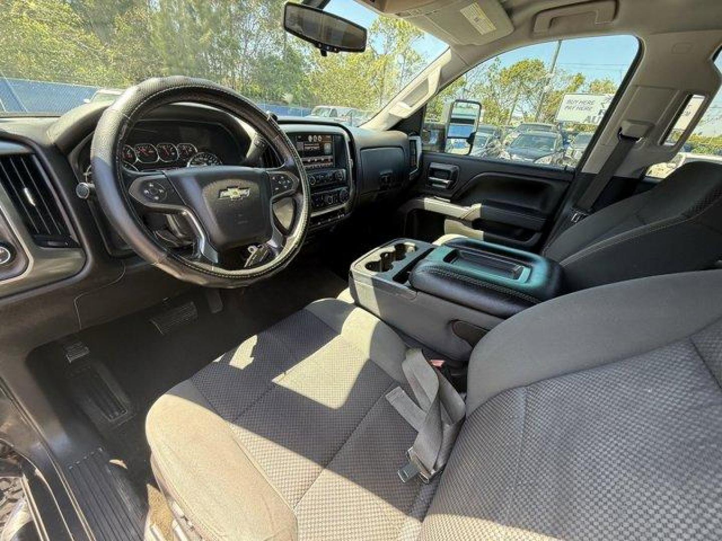 2014 Tungsten Metallic /Jet Black Chevrolet Silverado 1500 LT (3GCUKREC9EG) with an 8 5.3L engine, Automatic transmission, located at 27610 S Dixie Hwy, Homestead, FL, 33032, (305) 749-2348, 25.510241, -80.438301 - NACTOY 2014 North American Truck of the Year. Boasts 22 Highway MPG and 16 City MPG! This Chevrolet Silverado 1500 boasts a Gas/Ethanol V8 5.3L/325 engine powering this Automatic transmission. WINDOW, POWER, REAR SLIDING WITH REAR DEFOGGER, WHEELS, 18 X 8.5 (45.7 CM X 21.6 CM) BRIGHT-MACHINED ALUMIN - Photo#11