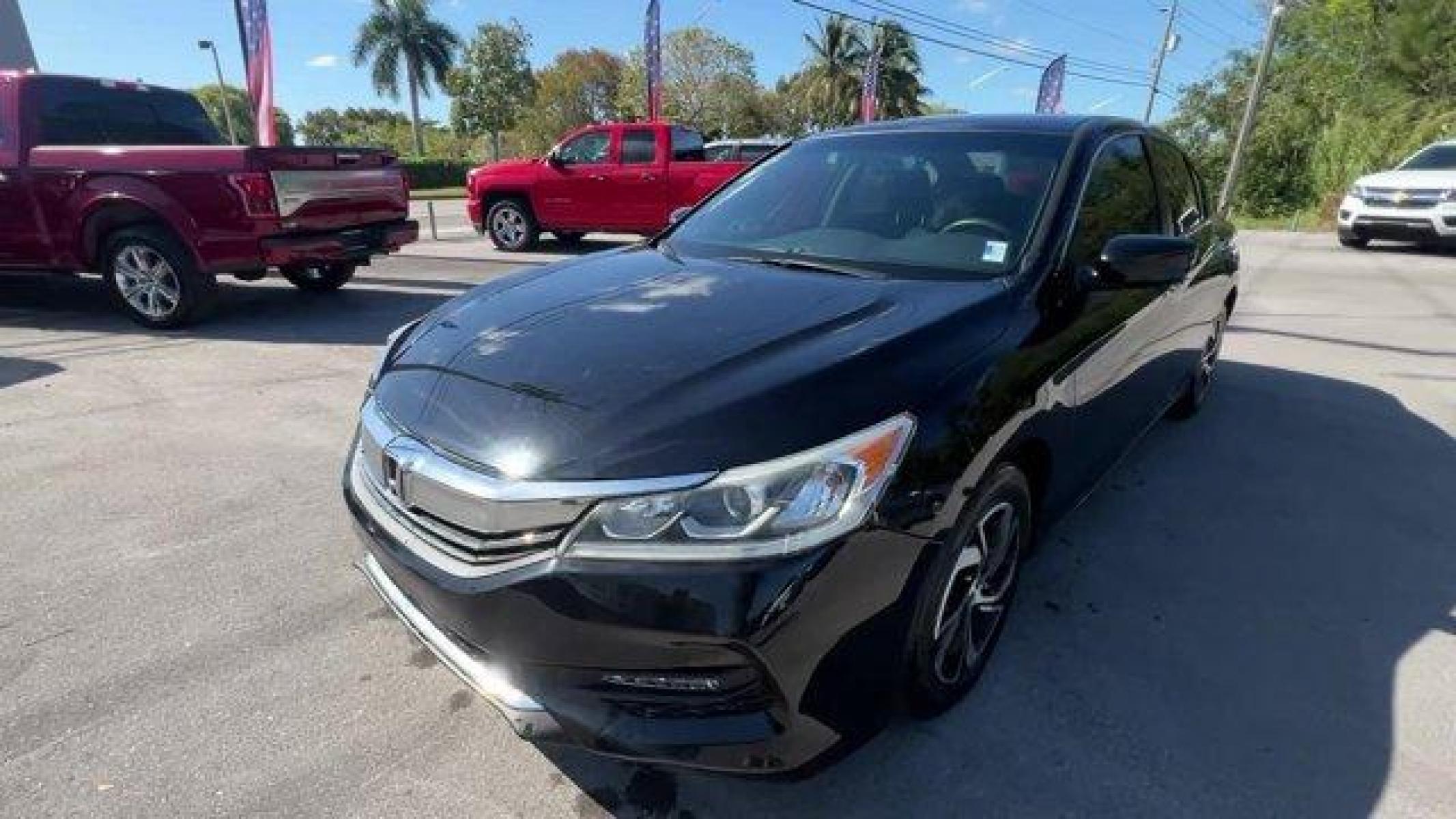 2016 Black Honda Accord Sedan LX (1HGCR2F32GA) with an 4 2.4 L engine, Variable transmission, located at 27610 S Dixie Hwy, Homestead, FL, 33032, (305) 749-2348, 25.510241, -80.438301 - KBB.com Brand Image Awards. Scores 37 Highway MPG and 27 City MPG! This Honda Accord Sedan delivers a Regular Unleaded I-4 2.4 L/144 engine powering this Variable transmission. Window Grid Antenna, Wheels: 16 Alloy, VSA Electronic Stability Control (ESC).* This Honda Accord Sedan Features the Follow - Photo #0
