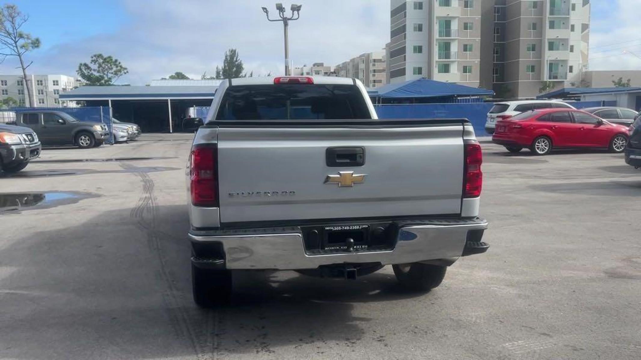 2014 Silver Ice Metallic /Jet Black/Dark Ash Chevrolet Silverado 1500 Work Truck (1GCRCPEH7EZ) with an EcoTec3 4.3L V6 Flex Fuel engine, Automatic transmission, located at 27610 S Dixie Hwy, Homestead, FL, 33032, (305) 749-2348, 25.510241, -80.438301 - Photo #12